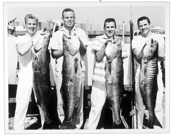 Bev Morgan, Bob Kulek, Bob and Bill with white sea bass off Catalina, 1957